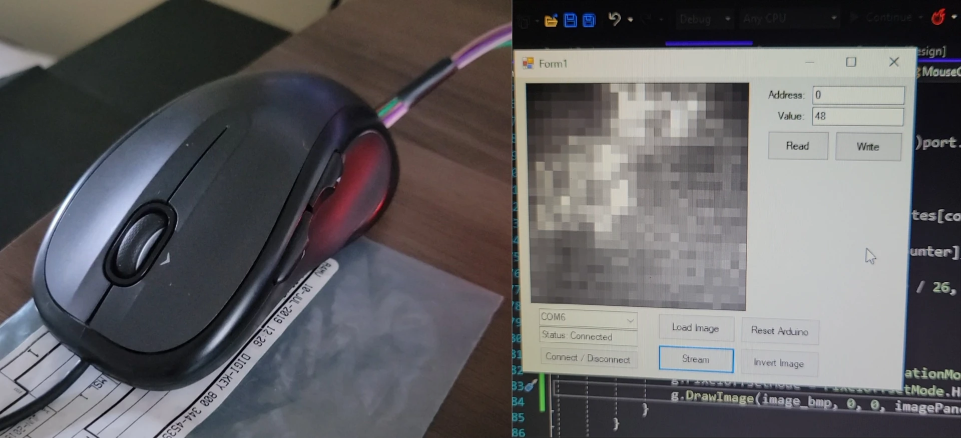 Mouse with modified serial port next to the Windows Forms app streaming live images from its optical sensor